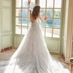 What You Need To Know About Wearing A Train Wedding Dress